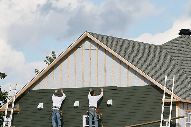 Professional Emergency Siding Repair technician working in Mill Run, PA